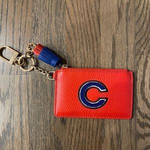 Authentic Tory Burch Monogram “C” Card Case Key Fob. Excellent condition.